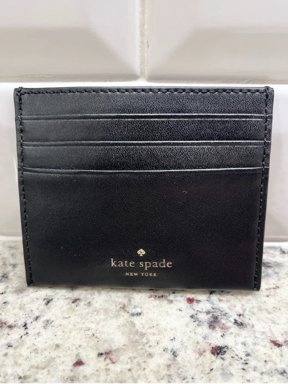 Rare kate spade Black Card Holder with White Ice Skate Appliqué and Gold Accents